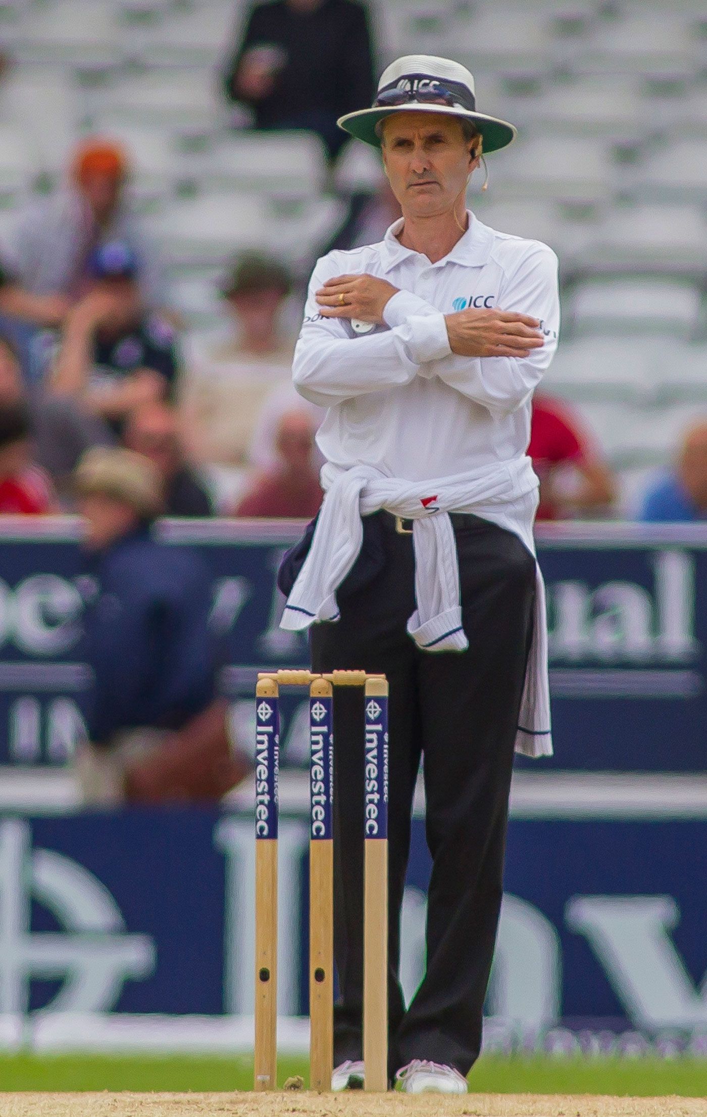 Umpire Billy Bowden signals a decision reversed