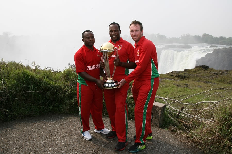 Prosper Utseya, Hamilton Masakadza and Brendan Taylor with the World Cup trophy at Victoria falls