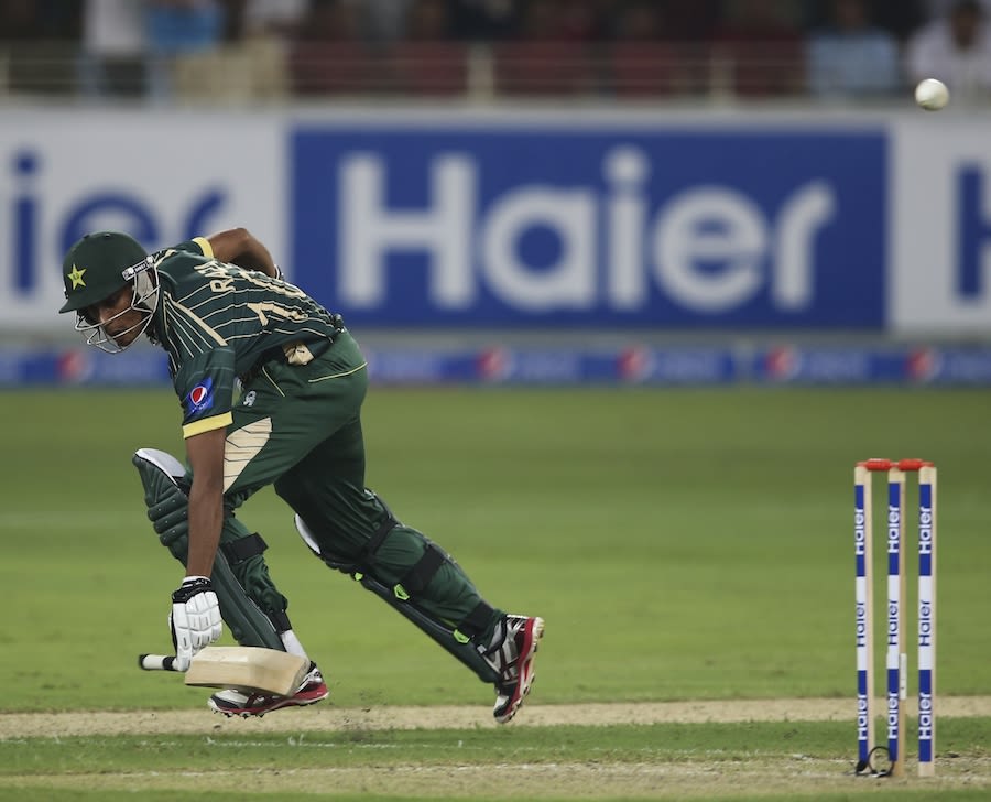 Raza Hasan loses the bat while completing a run