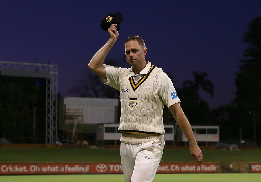 Nathan Rimmington doffs his hat after a five-for