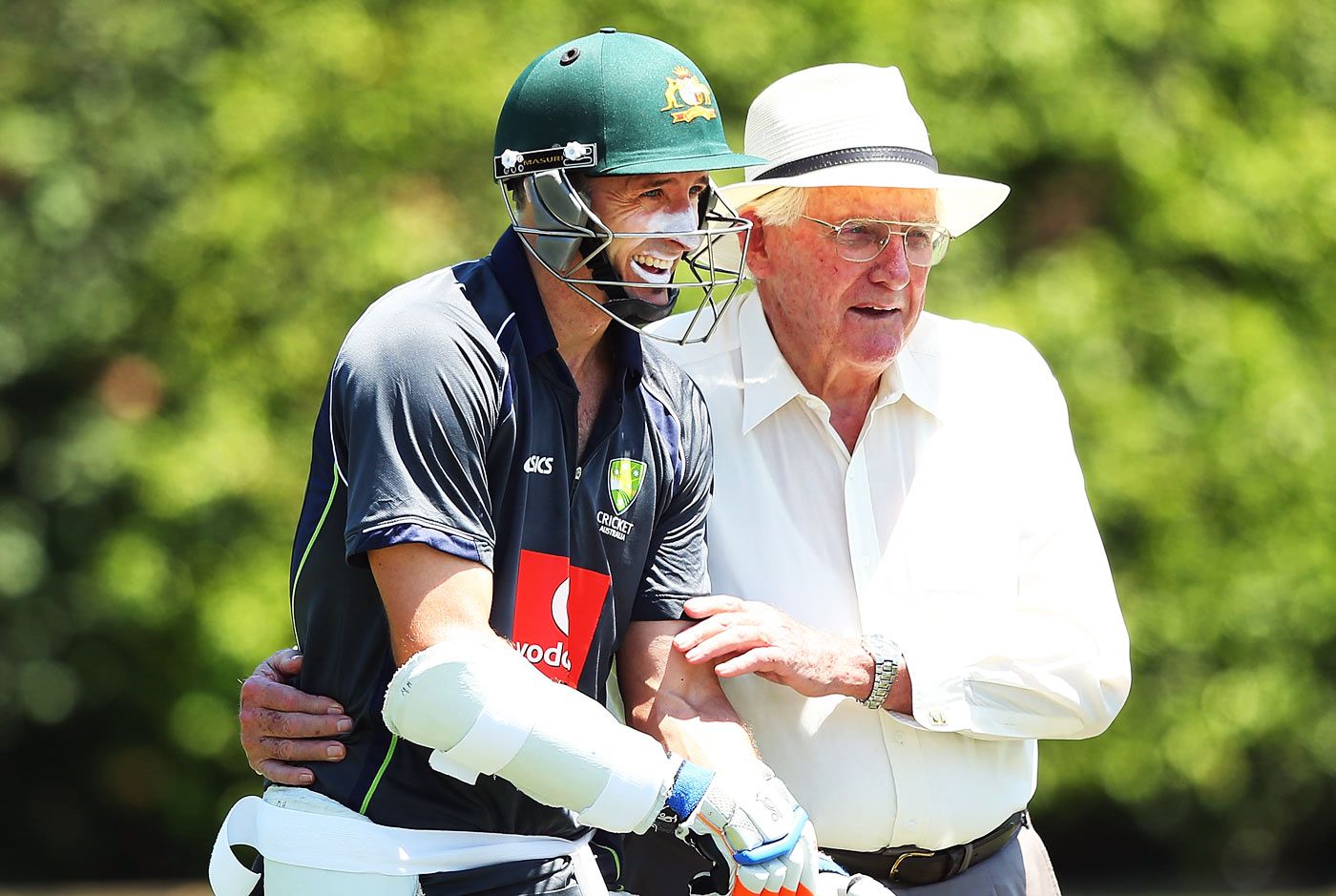 Michael Hussey shares a laugh with former Australian allrounder Alan Davidson