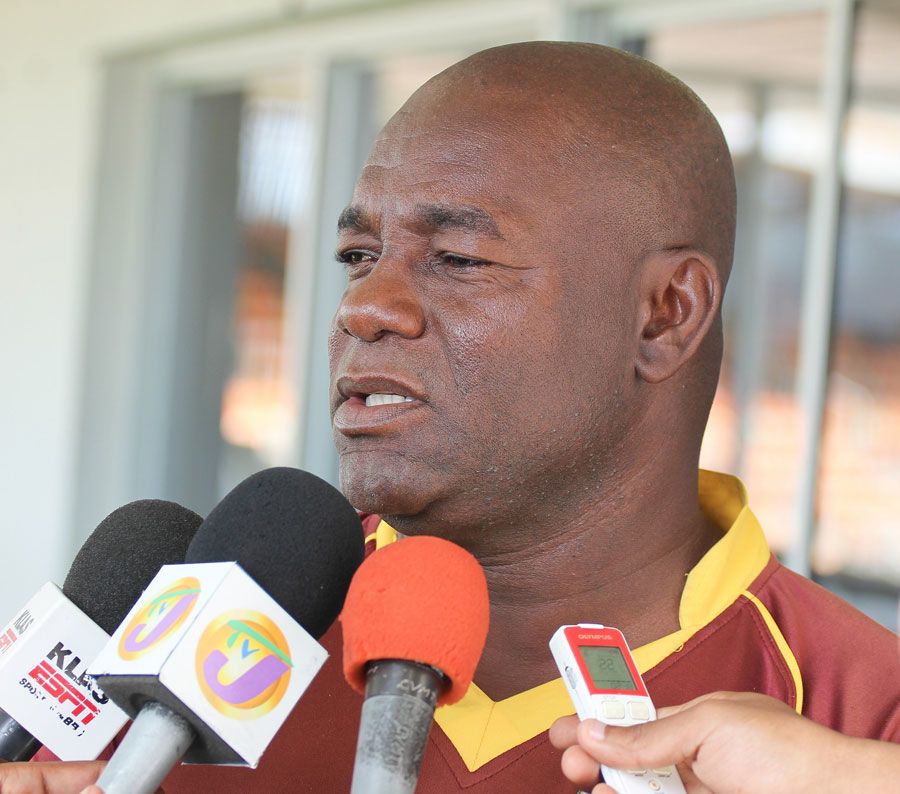 Leeward Islands coach Ridley Jacobs talks to the media