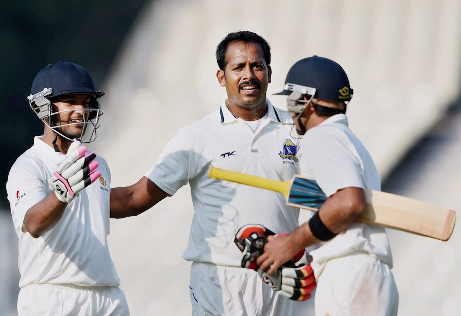 Shib Paul greets the two Karnataka batsmen who sealed the win