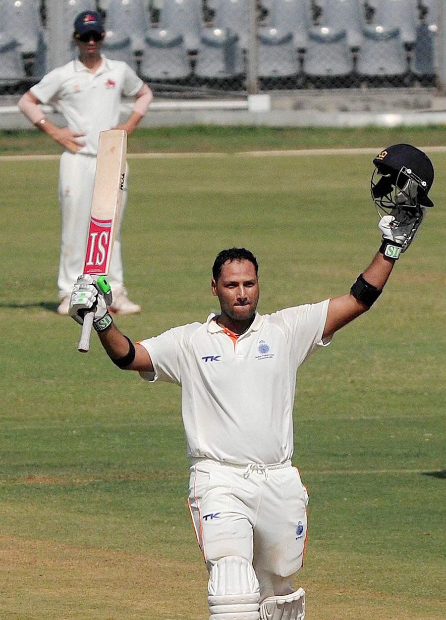 Devendra Bundela exults after reaching his century