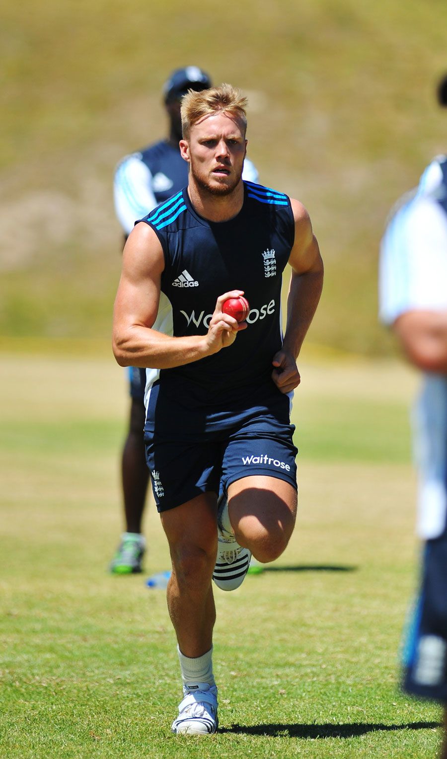 Matt Dunn bowls during a Lions net session