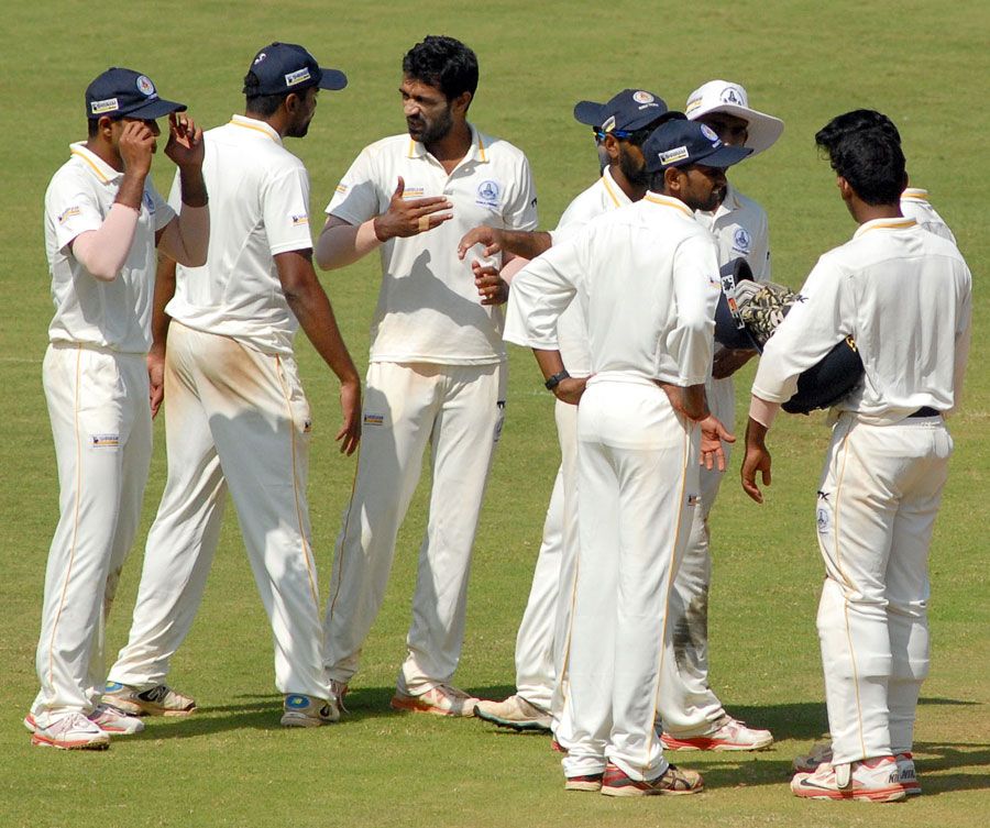 Rahil Shah is congratulated after a wicket