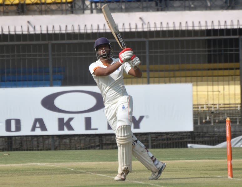 Jalaj Saxena flays the ball during his century