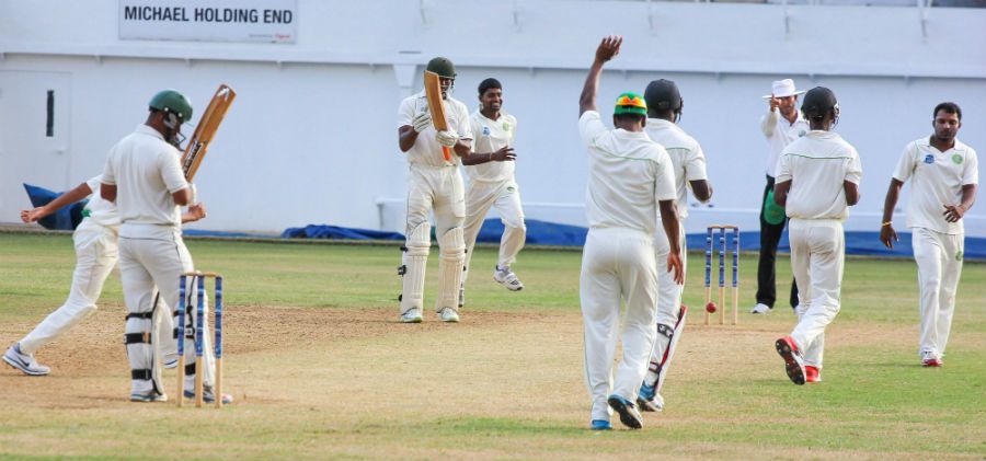 Carlton Baugh is trapped lbw by Veerasammy Permaul