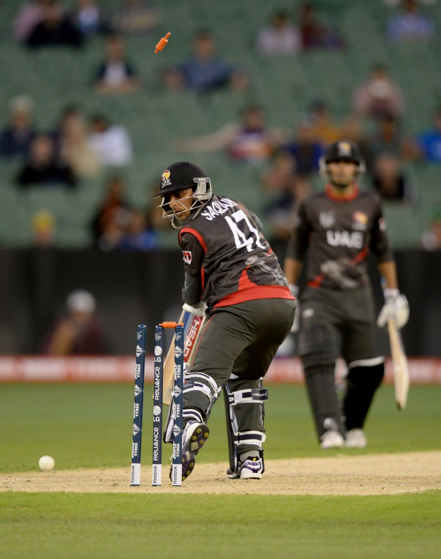 Saqlain Haider is bowled by Shane Watson