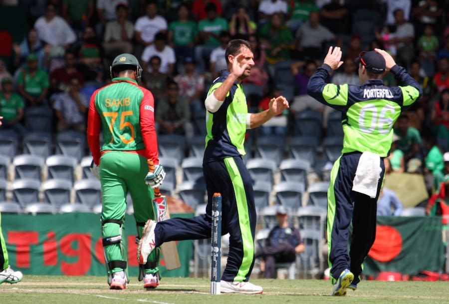 Max Sorensen is congratulated after dismissing Shakib Al Hasan