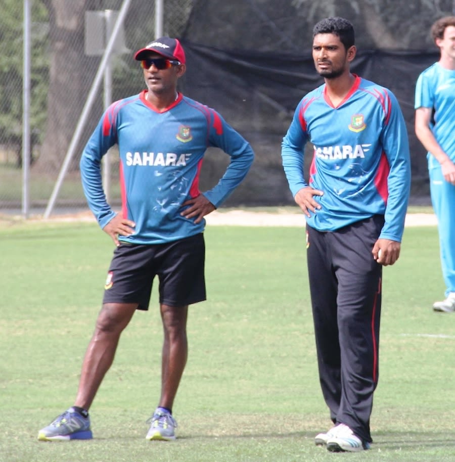 Mahmudullah and Ruwan Kalpage watch the Bangladesh players practice