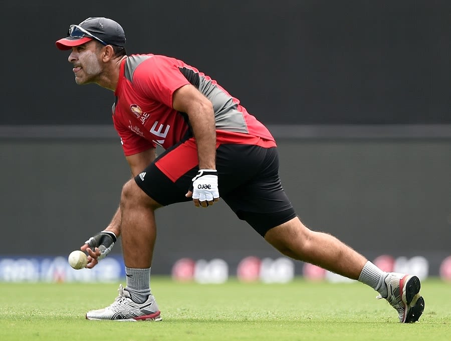 Mohammad Tauqir prepares to under-arm the ball during training