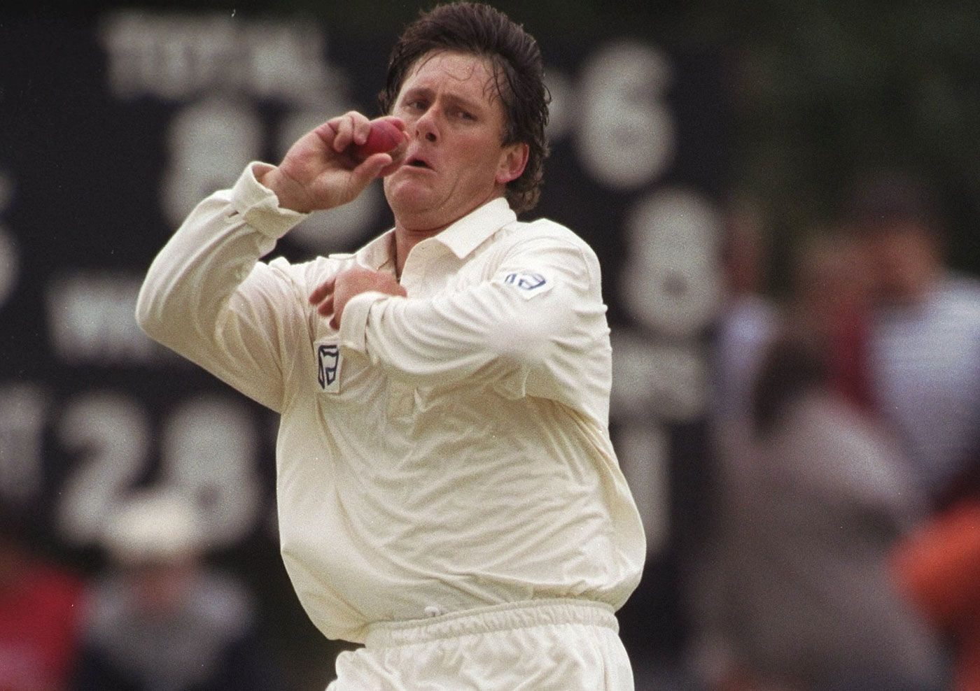 Brian McMillan bowls in a tour game