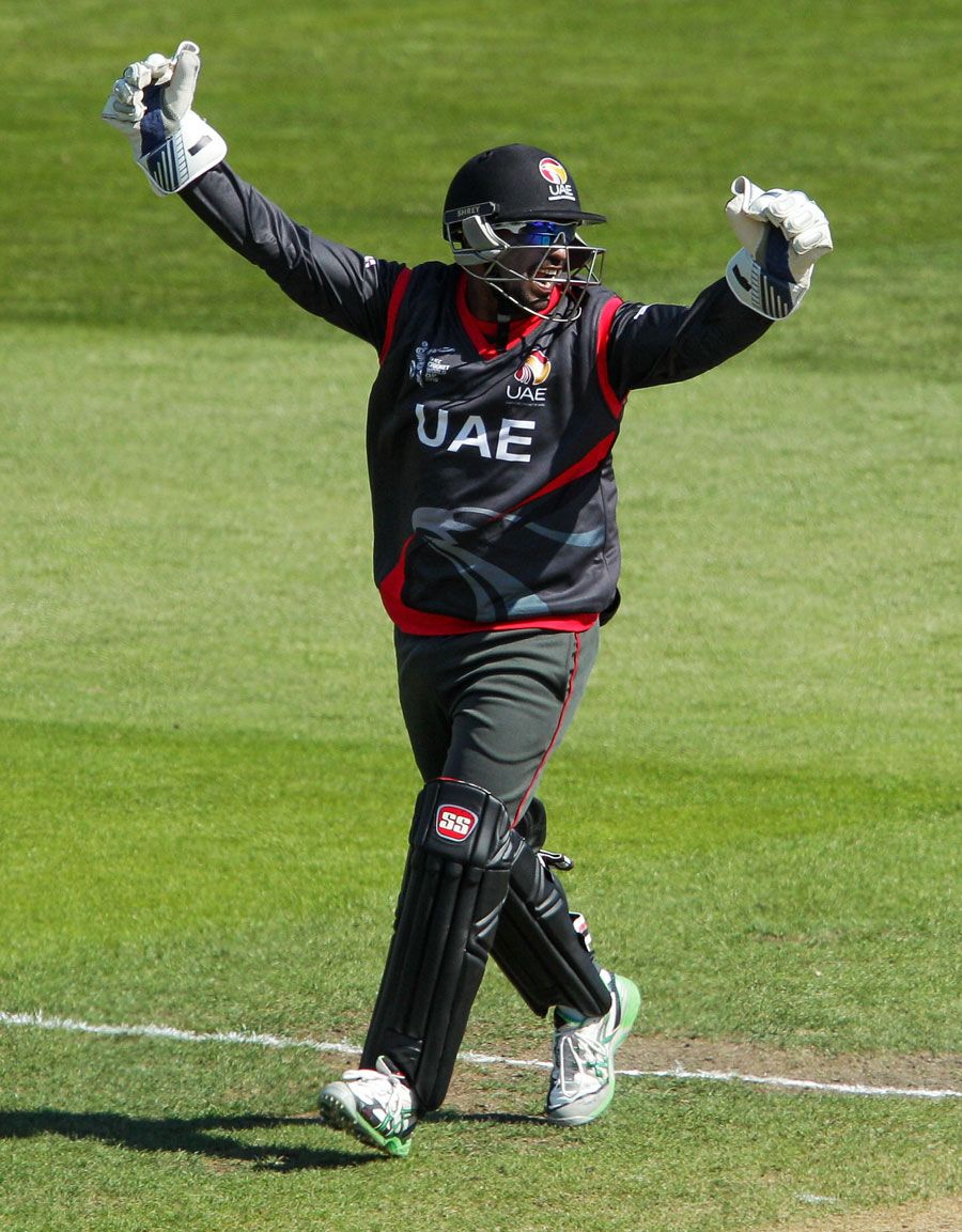 Swapnil Patil celebrates the fall of a wicket