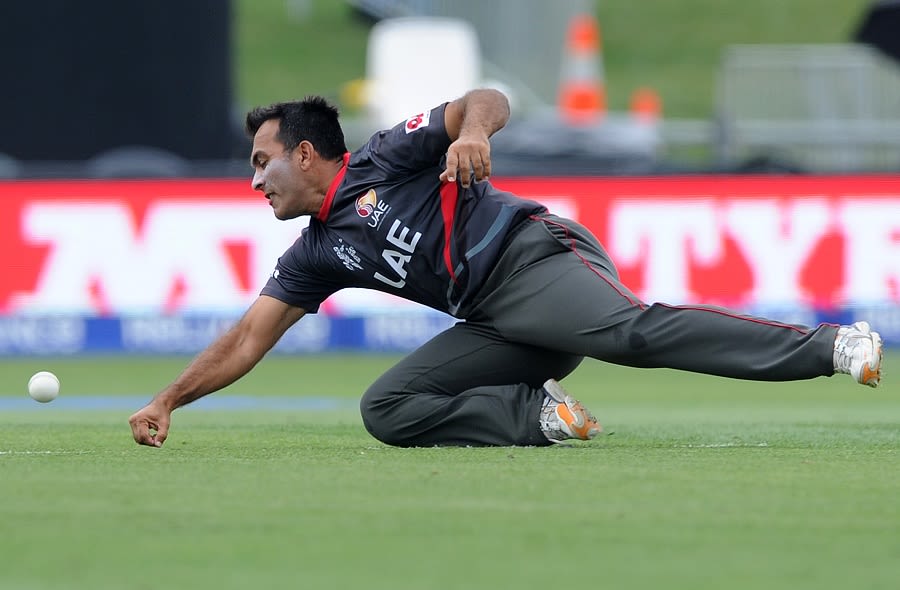 Mohammad Tauqir dives in an attempt to stop the ball