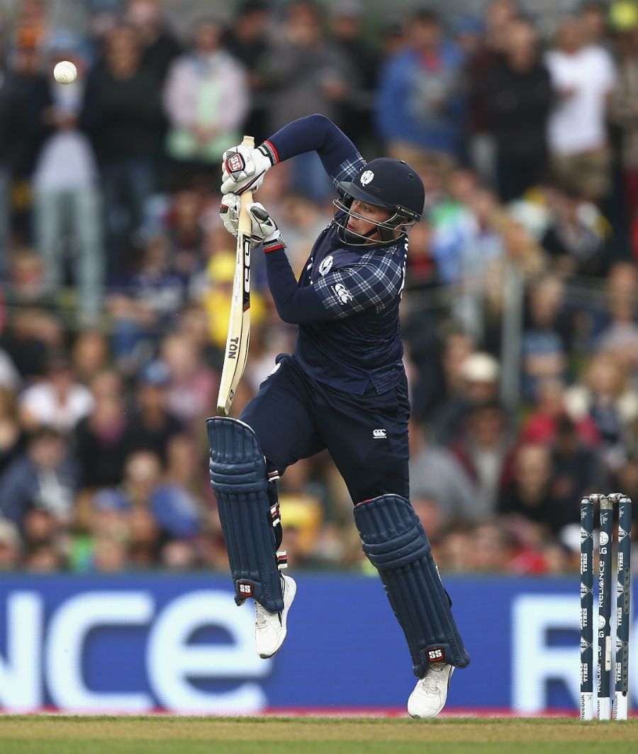 Matt Machan fends off a short delivery