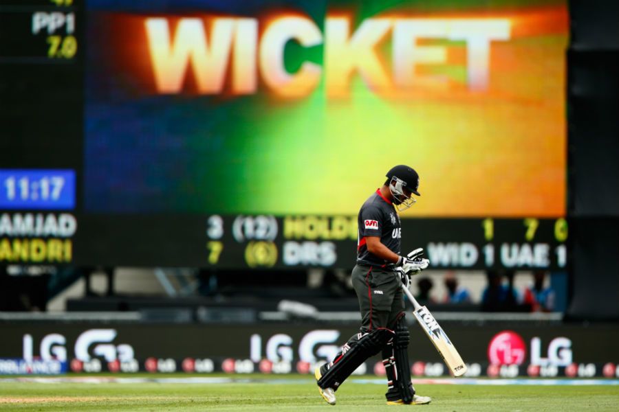 Andri Berenger walks off the field after losing his wicket