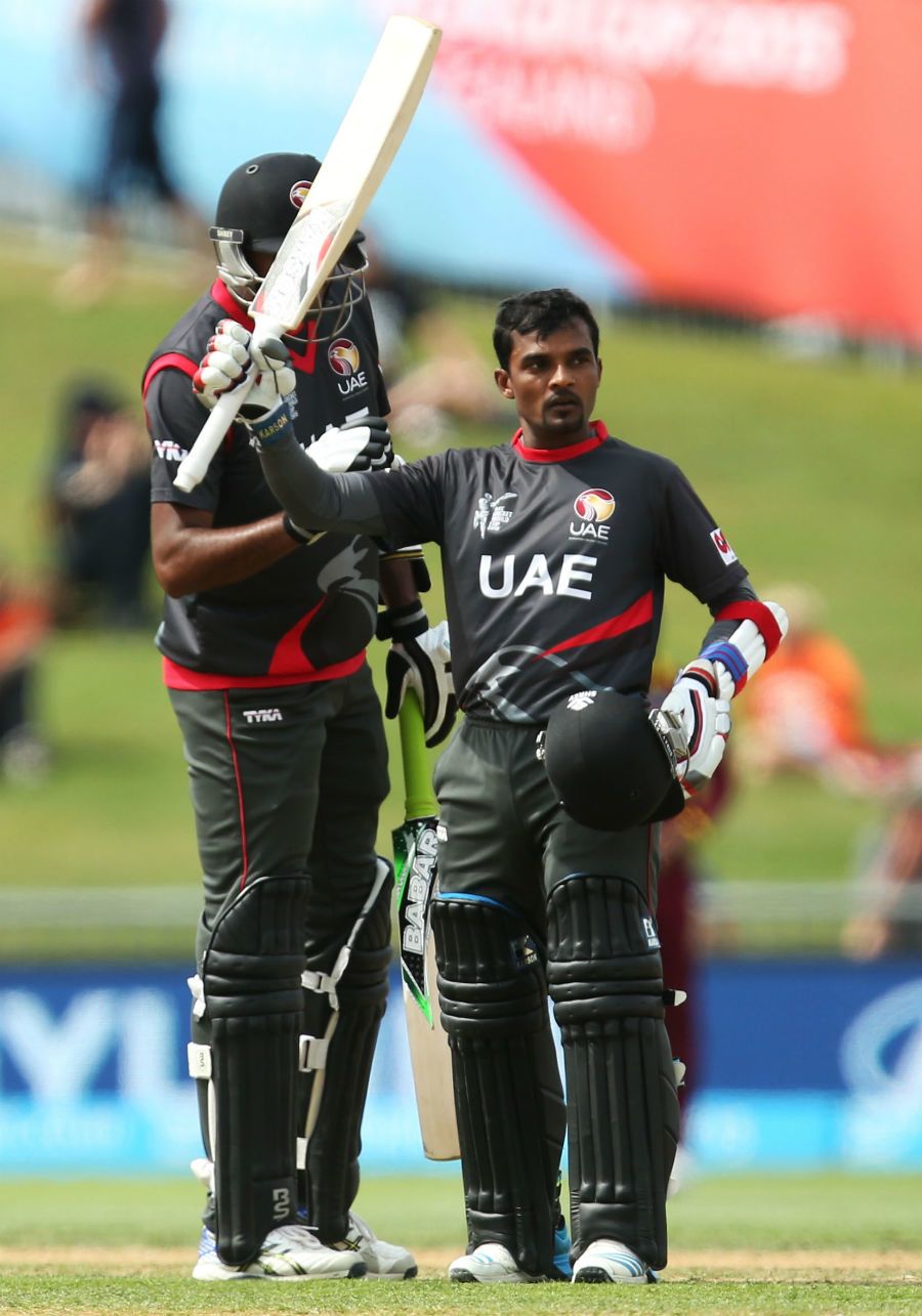 Nasir Aziz raises his bat after getting his maiden ODI fifty