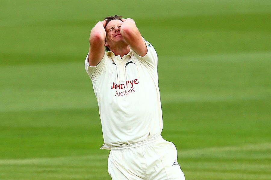 Will Gidman with head in hands