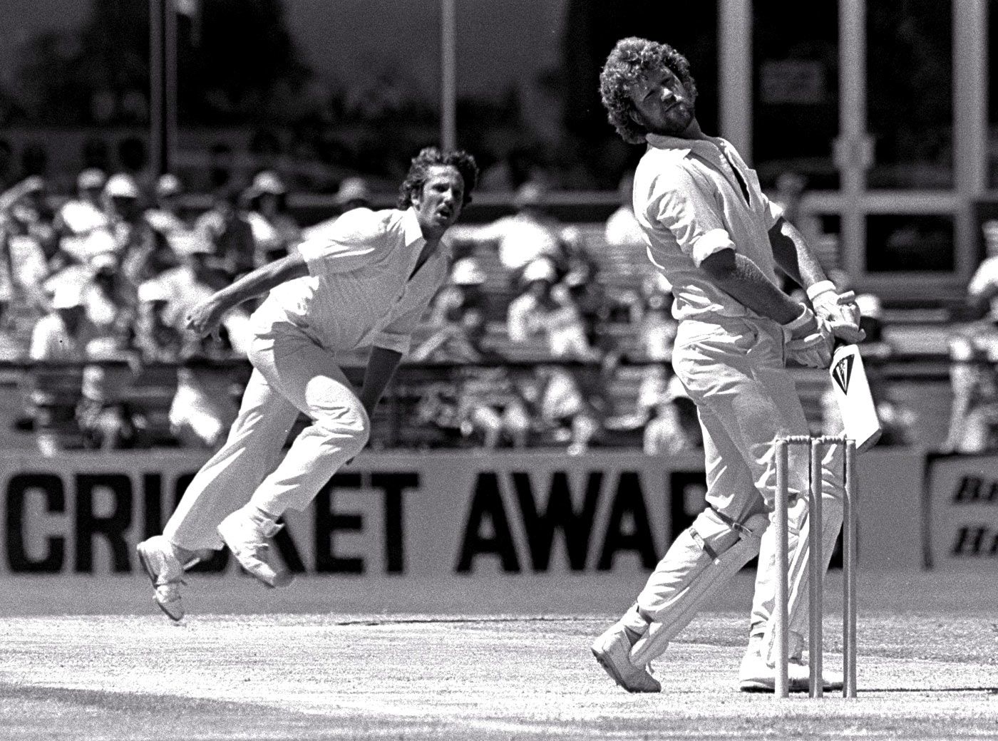 Gary Cosier pulls away from a delivery bowled by Ian Botham