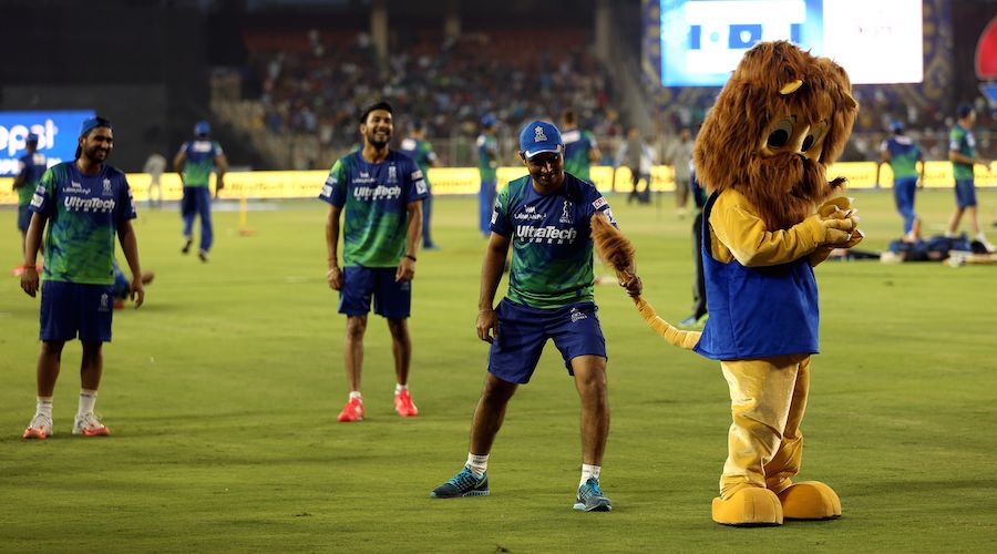 Rajat Bhatia plays around before the start of the match