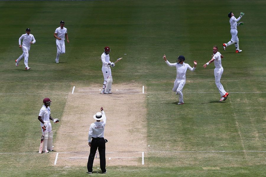 Billy Bowden raises a finger to confirm Denesh Ramdin's fate