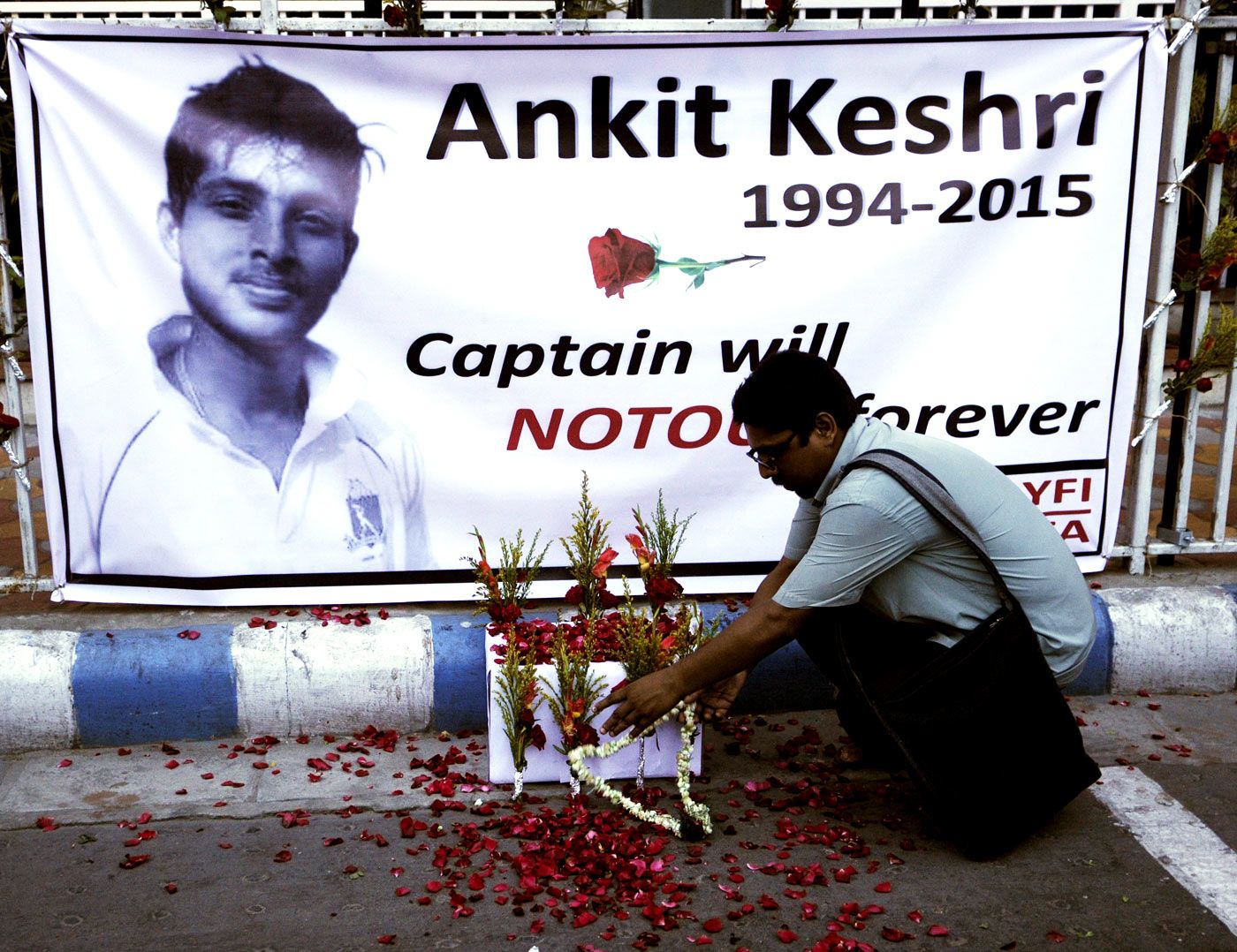 A poster in memory of Ankit Keshri, the Bengal player who died in hospital