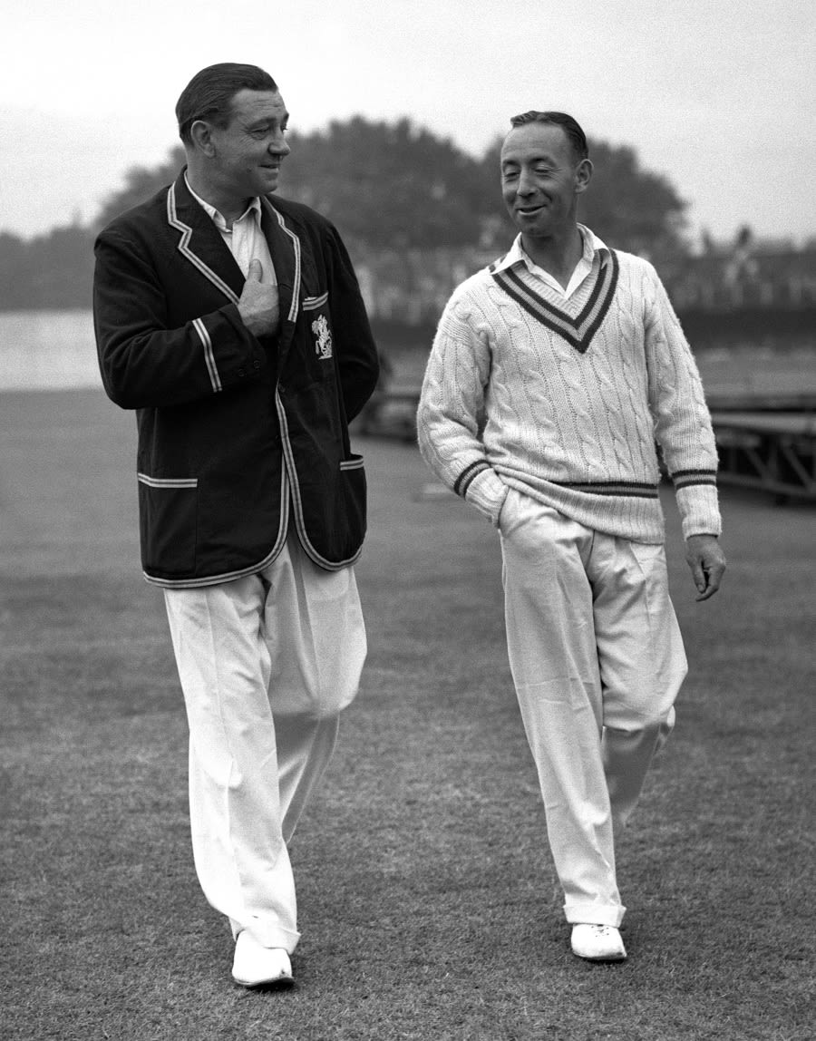 Wally Hammond and Lindsay Hassett walks back from the toss