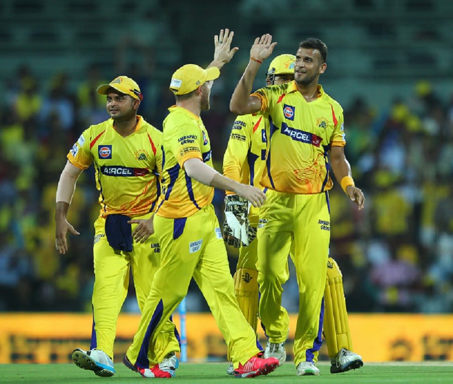 Ishwar Pandey is congratulated on the wicket of AB de Villiers