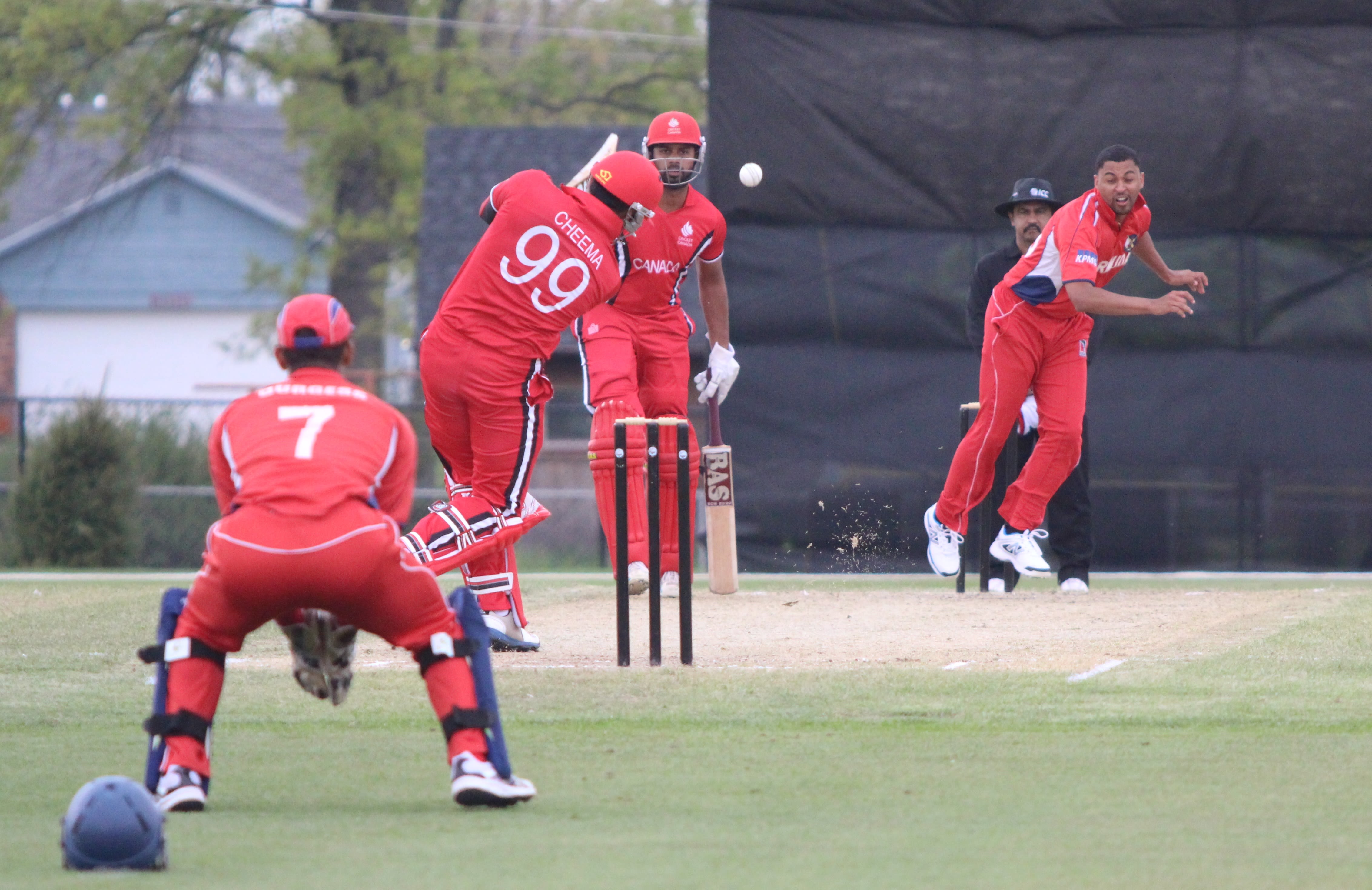 Rizwan Cheema hits Stefan Kelly back over his head for six