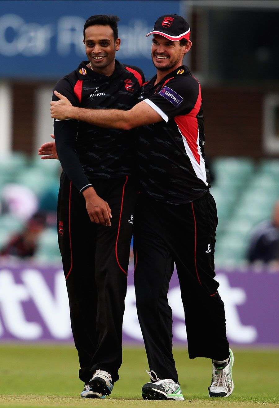 Jigar Naik is congratulated by Clint McKay
