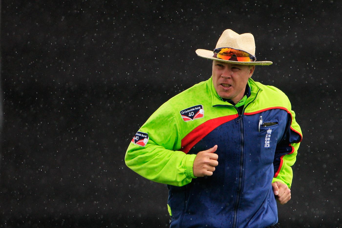 Umpire Martin Saggers runs off