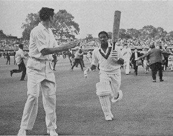 Basil Butcher leaves the field after scoring an unbeaten 129 against England