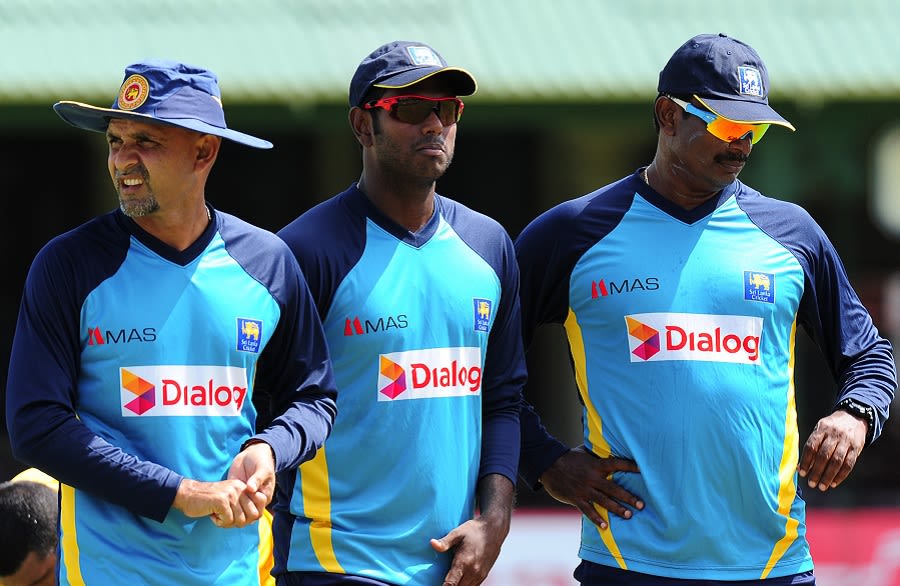 Brains trust: Angelo Mathews watches Sri Lanka's practice session with head coach Marvan  Atapattu and bowling coach Champaka Ramanayake