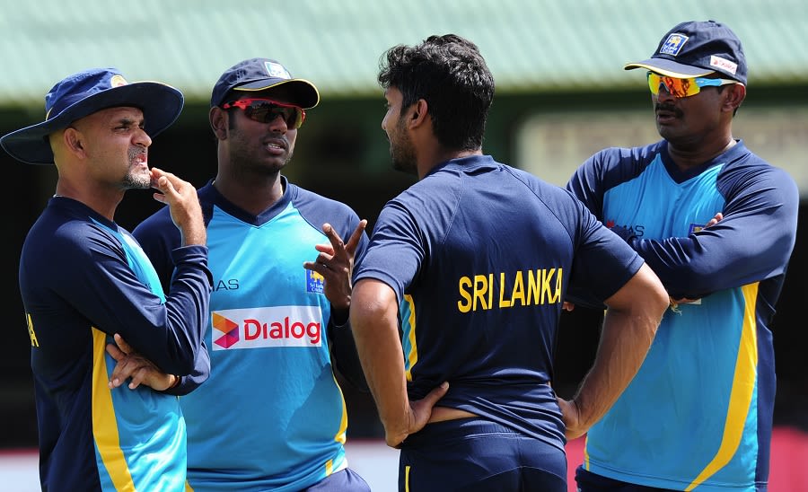 Angelo Mathews is locked in discussion with Kumar Sangakkara, Marvan Atapattu and Champaka Ramanayake