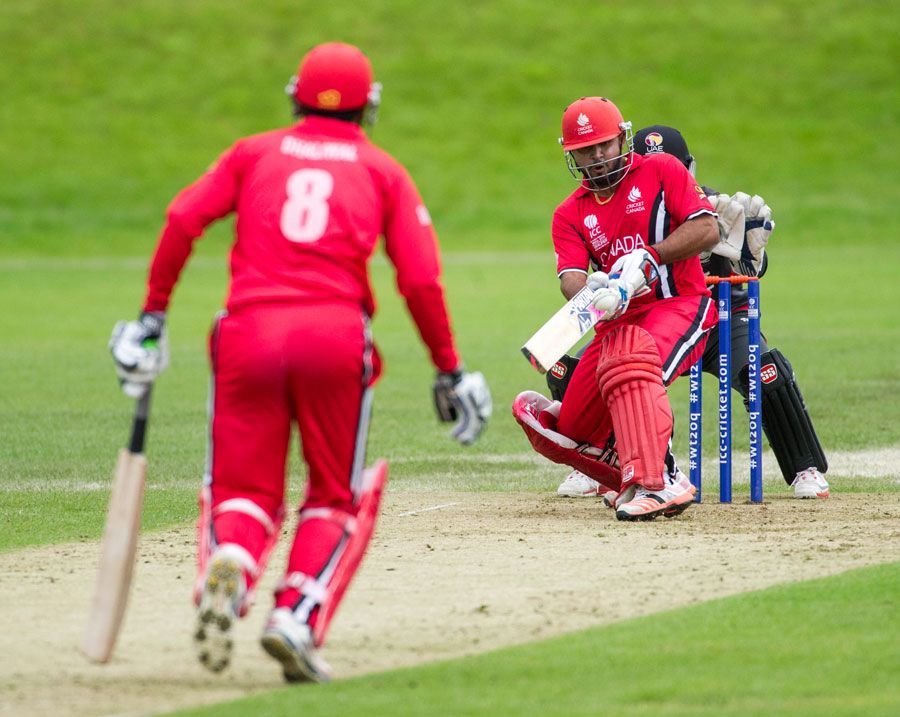 Hiral Patel plays the paddle sweep en route to his 45