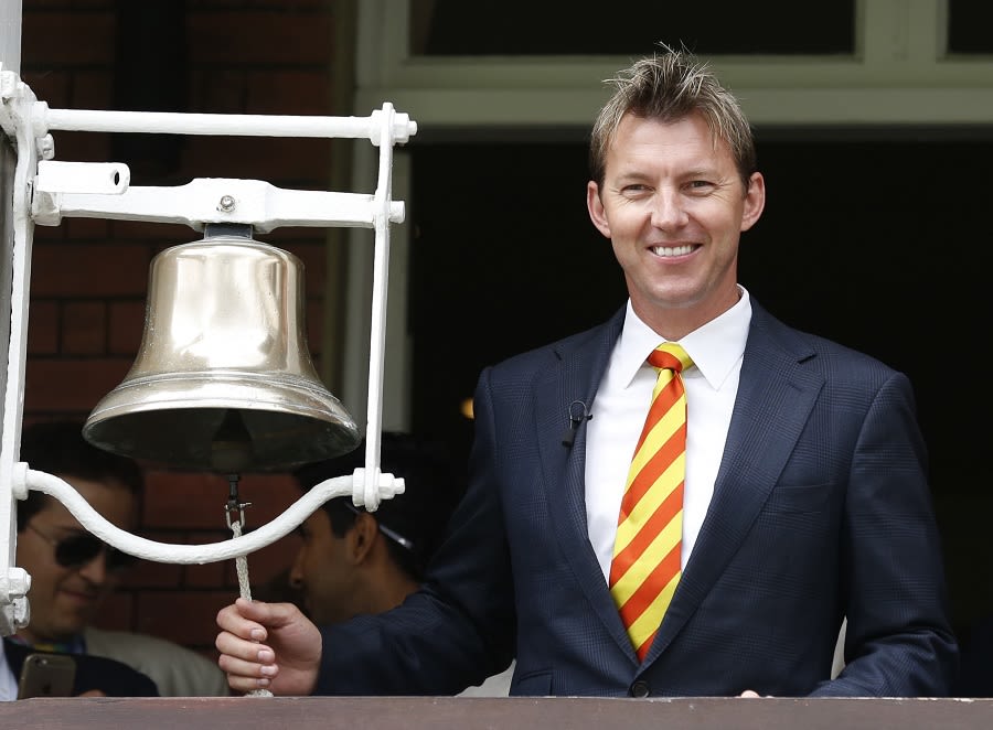 Brett Lee rings the five-minute bell ahead of the start of play on the second day