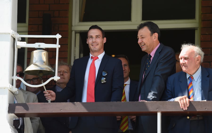 Simon Jones rings the five-minute bell ahead of the start of play on the third day