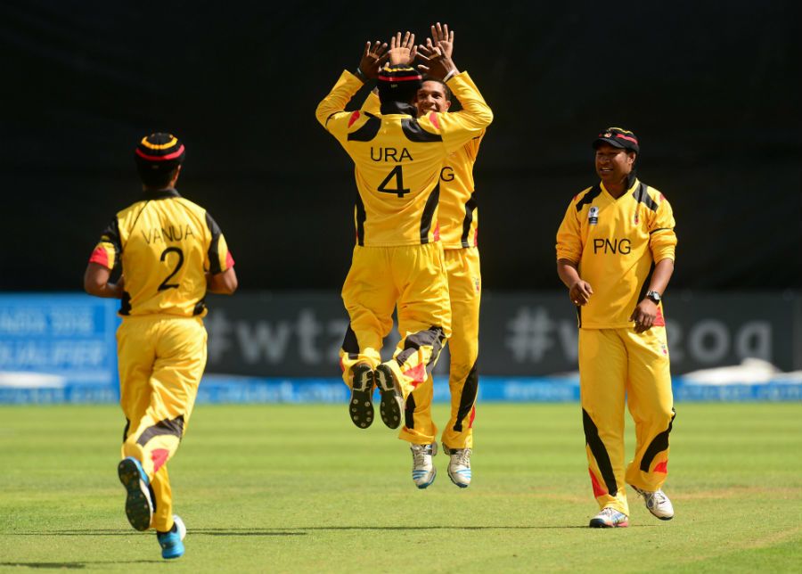 Tony Ura gets a leaping high-five from Charles Amini
