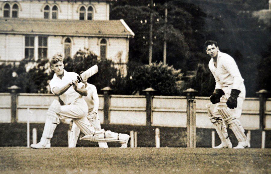 Trevor Barber sweeps during a knock for Wellington in the 1950s
