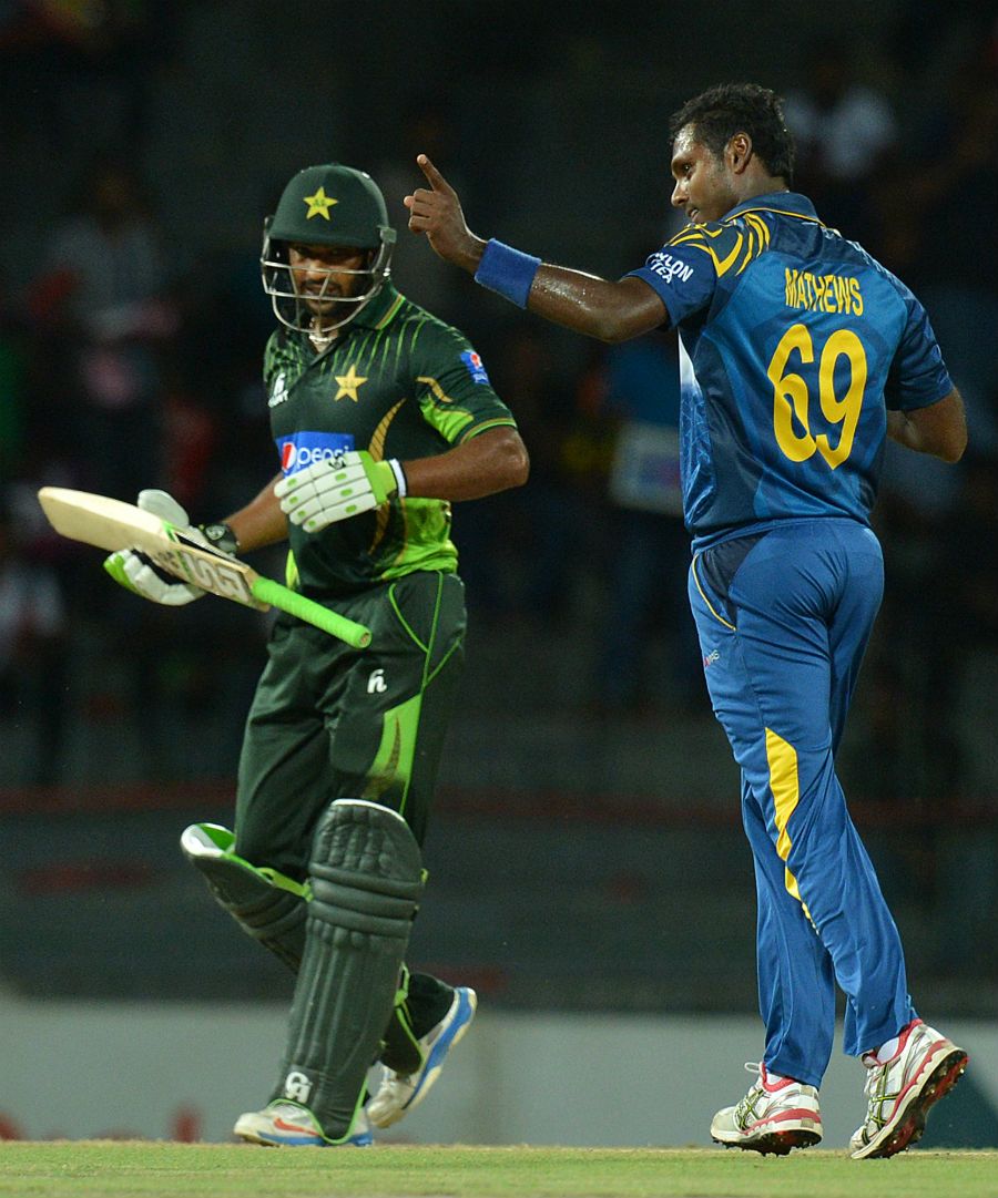 Angelo Mathews celebrates the wicket of Mukhtar Ahmed