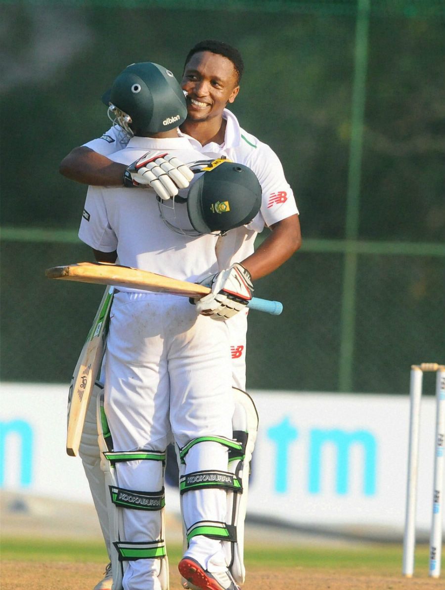 Omphile Ramela gets a hug from Temba Bavuma after completing his ton