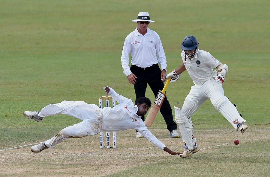 Tharindu Kaushal attempts to field off his own bowling