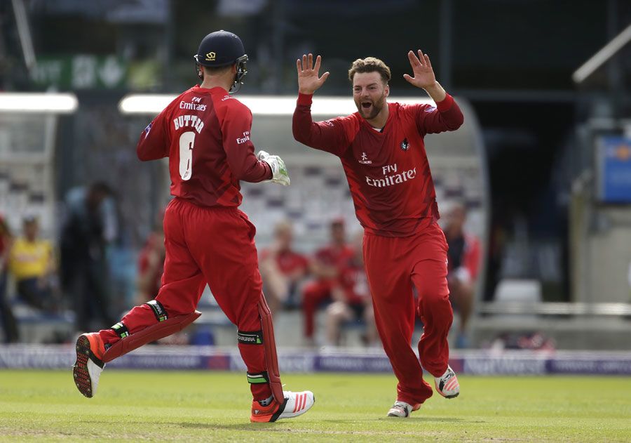 Jos Buttler and Arron Lilley celebrate one of the spinner's two scalps