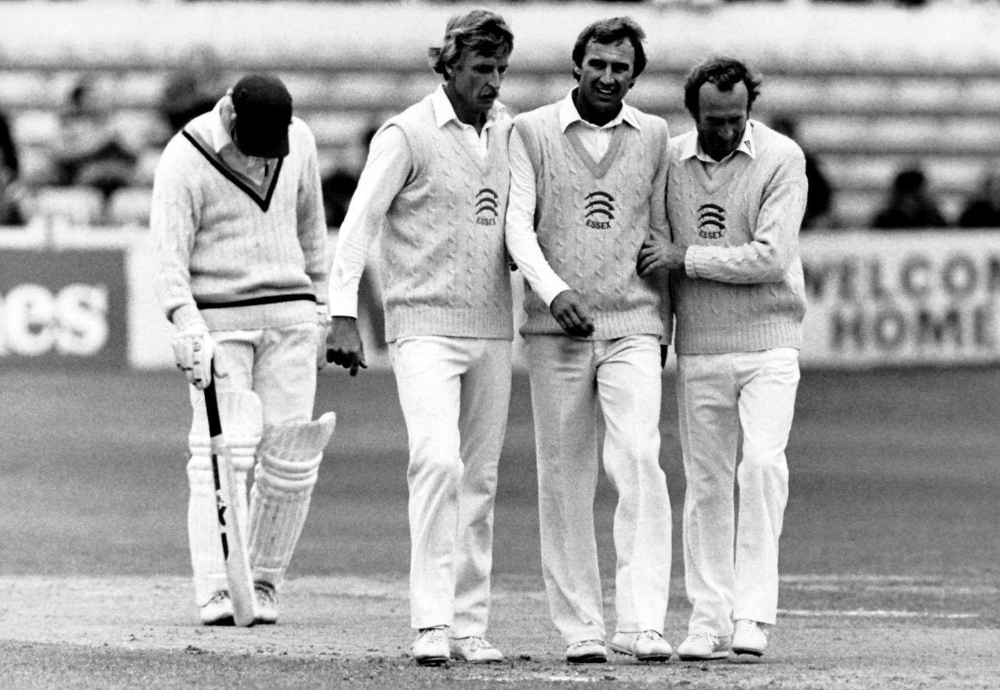 Stuart Turner, John Lever and Keith Fletcher leave the field at the end of the match