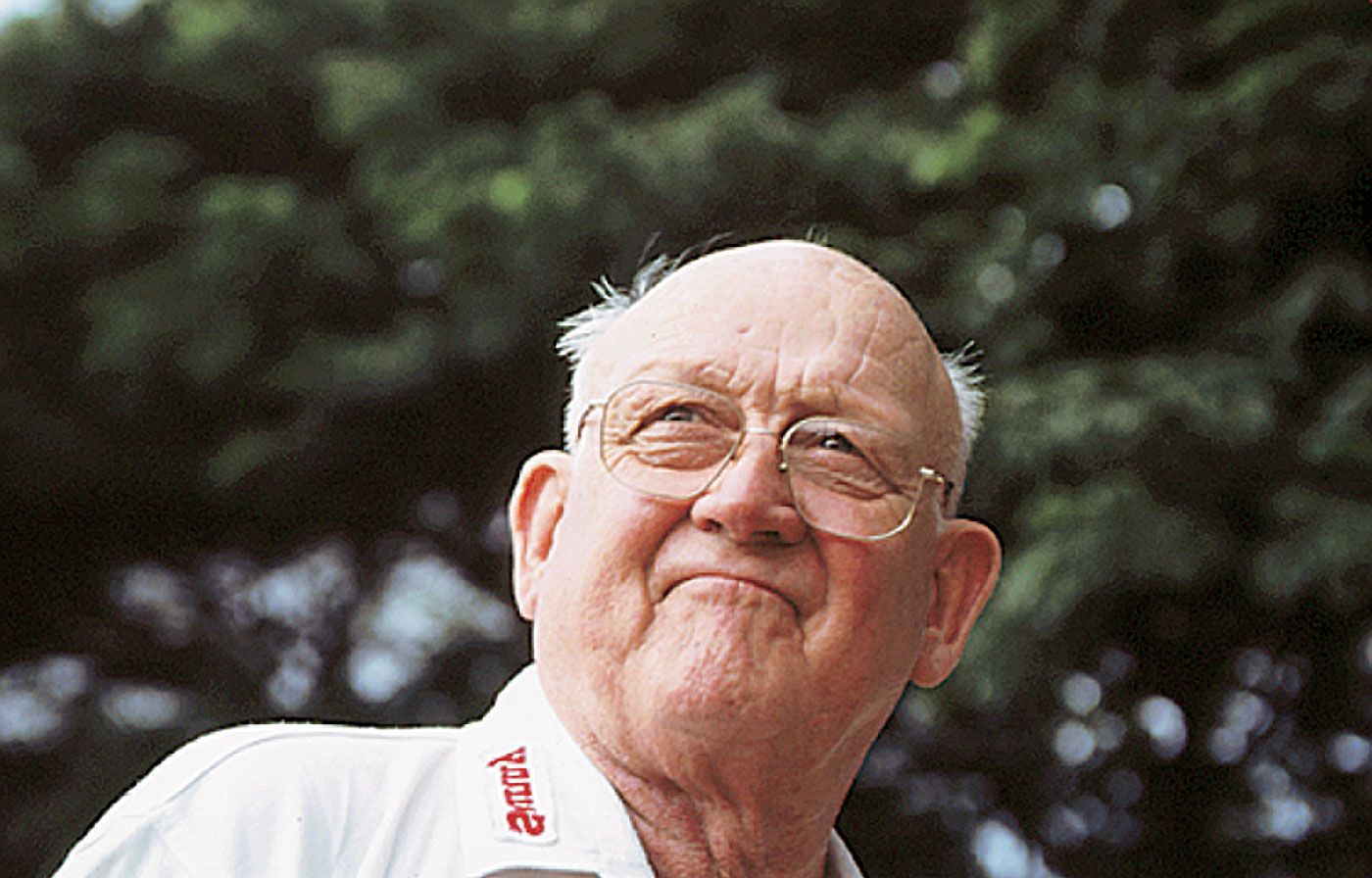 Frank Tyson looks on during a bowling camp