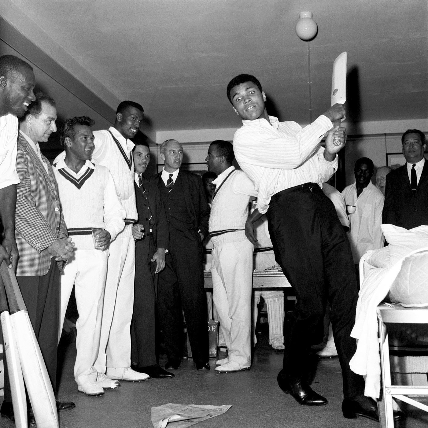 West Indies players watch Muhammad Ali bat in their dressing room at Lord's