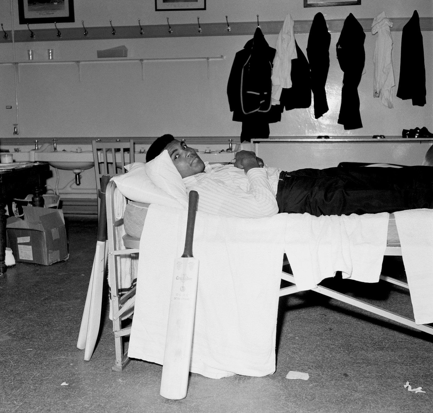 Muhammad Ali relaxes in the West Indies dressing room at Lord's