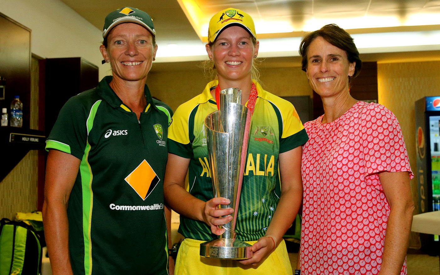 Coach Cathryn Fitzpatrick, captain Meg Lanning and ICC women's committee member Belinda Clark pose with the World T20 trophy