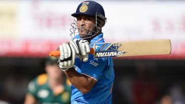 Delhi win big despite Dhoni 70*